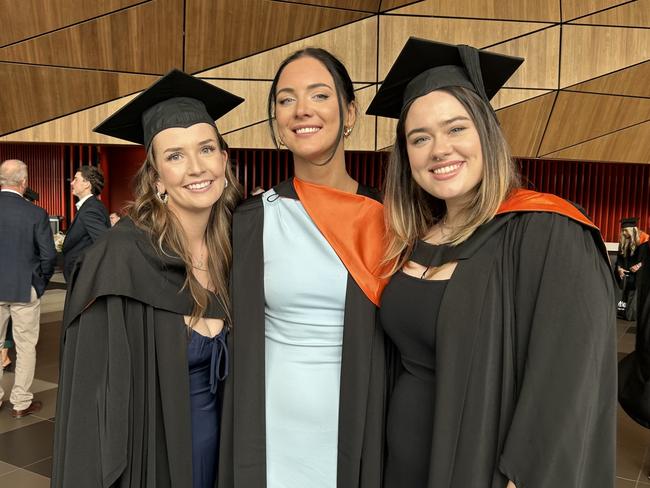 Evie Yallouz, Abbey Hipwell, and Leah Cheevers graduate with a Bachelor of Occupational Therapy from the Australian Catholic University on April 17, 2024. Picture: Brittany Busch