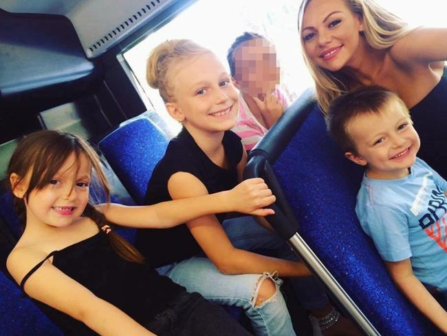 Bella with her kids, Kiera, 8 Alyssa, 9 and Connor, 6. Picture: Caters