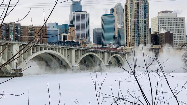 Mist rises off the Mississippi River in Minneapolis where temperatures have been dipping below zero recently.