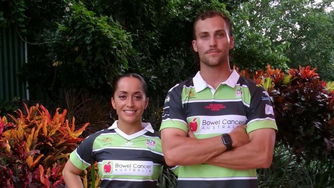 Todd McManus and Courtney Tamati model Darwin Dragons' Bowel Cancer Awareness jerseys.