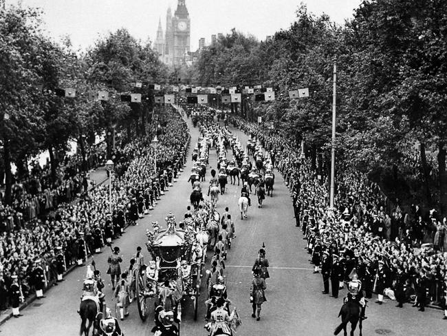 The royal carriage of Queen Elizabeth II passes along Victoria Embankment on its way to Westminster Abbey, on June 2, 1953, during the ceremony of coronation of the Queen. Picture: AFP