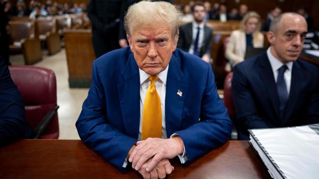 Donald Trump awaits the start of proceedings in his criminal trial at Manhattan Criminal Court on Thursday US time alongside one of his lawyers, Emile Bove. Picture: Doug Mills / Pool / AFP