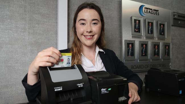 Georgia Henderson signing in to the Central Coast Leagues Club with the current ID machine that scans a drivers license. Picture: David Swift