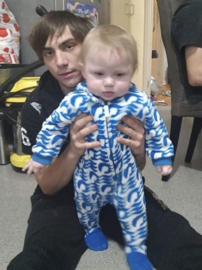 Brayden, who has been described as a devoted father, with his child Charlie Ray. Picture: Supplied by family