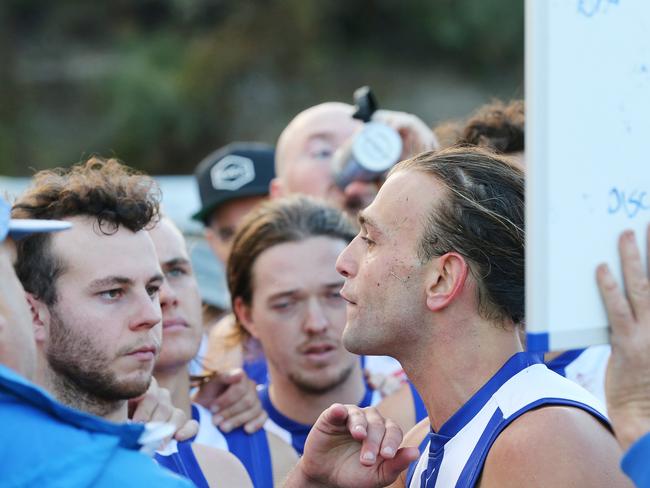 Anglesea player coach Jordan Keras talks to his players at three-quarter time. Picture: Alan Barber