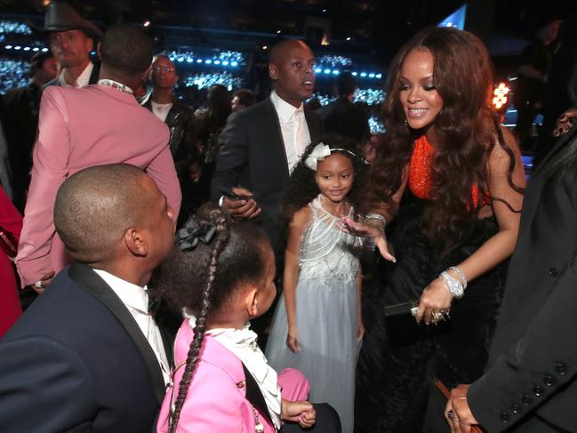 Jay-Z, daughter Blue Ivy Carter and Rihanna during The 59th GRAMMY Awards at STAPLES Center on February 12, 2017 in Los Angeles, California. Picture: Getty