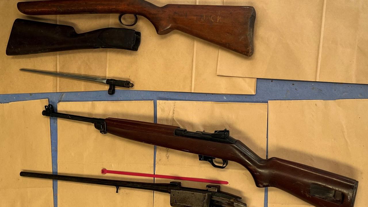 Ammunition and six unregistered rifles, including a SKK 7.62 rifle, were found at his home. Picture: SA Police