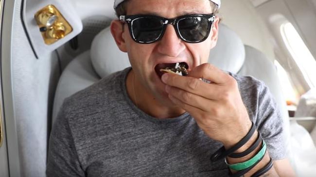 The internet star tries caviar on an Emirates flight from Dubai to New York.