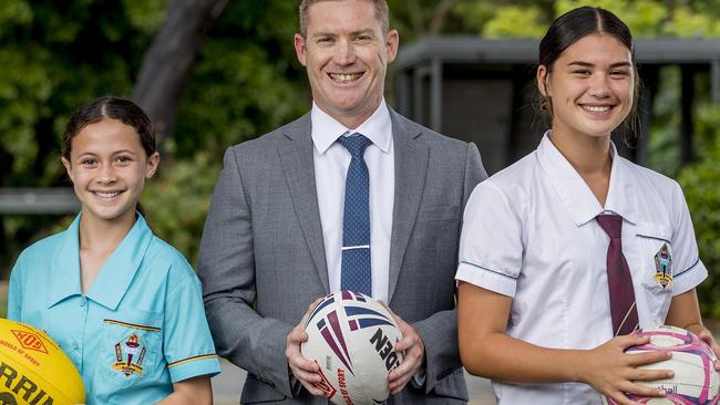 Keebra Park principal Adam Brandis with students, Okalani Compton, 11, and Sunny Gerrard, 16. Picture: Jerad Williams