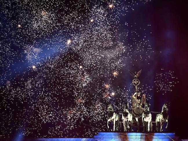 Fireworks explode over Berlin’s landmark the Brandenburg Gate. Picture: AFP