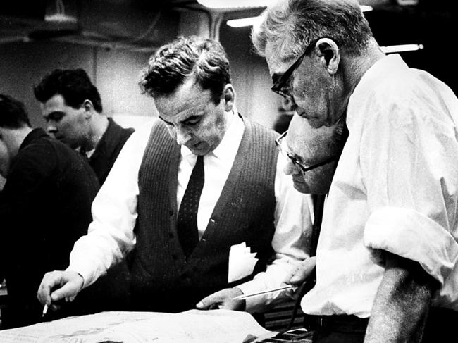 Rupert Murdoch checks a page one proof for The Australian in Canberra, in July 1964. Picture: News Limited