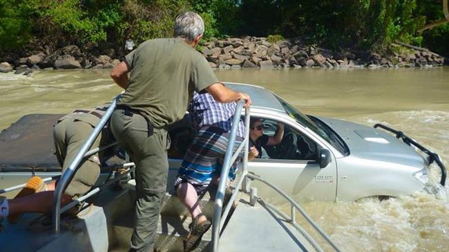 Lucky to be alive: A woman was rescued from her stranded ute in Kakadu National Park.
