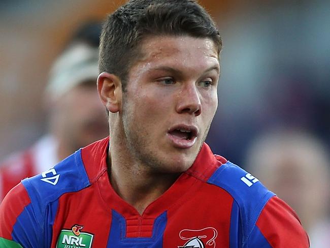 NEWCASTLE, AUSTRALIA - JUNE 25: Jack Cogger of the Knights passes the ball during the round 16 NRL match between the Newcastle Knights and the St George Illawarra Dragons at Hunter Stadium on June 25, 2016 in Newcastle, Australia.  (Photo by Tony Feder/Getty Images)