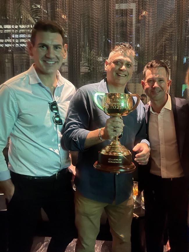 Nick Holland, Jonathan Rosham, Ricky Ponting with the cup.