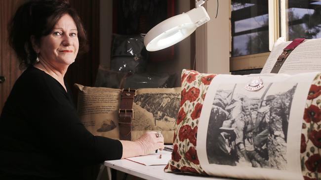 Artist Suzanne Curry has been sewing and printing cushions to commemorate the sacrifices of the ANZACs.Picture: MATHEW FARRELL