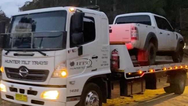 A white dual cab ute seized by police on Sunday night from a property near the Elfalaks’ property.