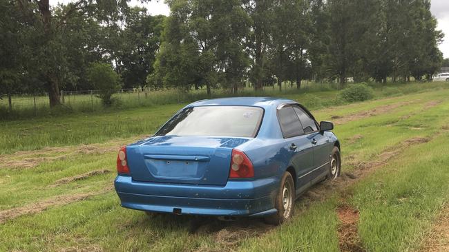 A car that crashed into a fence and a stormwater drain after losing control on the dirt section of Prince Street, Grafton.