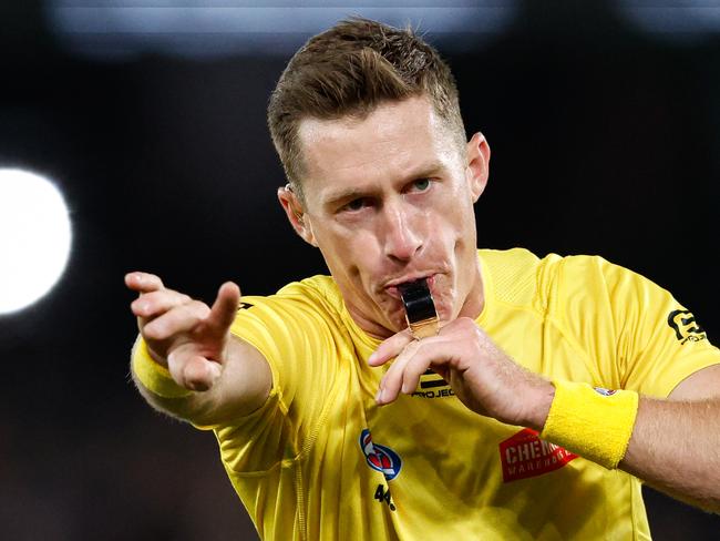 MELBOURNE, AUSTRALIA - MAY 31: AFL Field Umpire, John Howorth blows his whistle during the 2024 AFL Round 12 match between the Collingwood Magpies and the Adelaide Crows at The Melbourne Cricket Ground on May 31, 2024 in Melbourne, Australia. (Photo by Dylan Burns/AFL Photos via Getty Images)