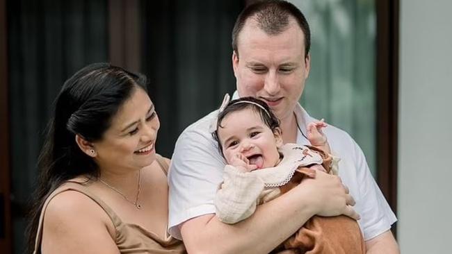 Meya and Callan hold their daughter Oliviae. Picture: Daily Mail