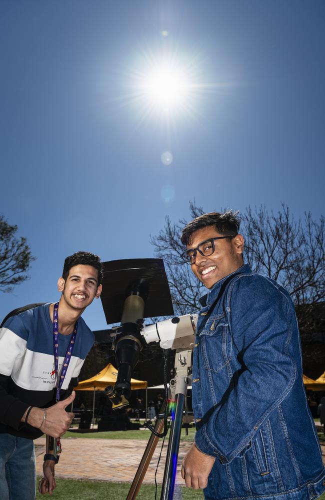 Anshul Vasishth (left) and Adhith Sivaharen after looking at the sun through a telescope at the iLAuNCH Space family fun day, part of UniSQ's Open Day, Sunday, August 18, 2024. Picture: Kevin Farmer