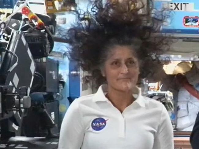 TOPSHOT - In this still image taken from a NASA TV broadcast, NASA astronauts Butch Wilmore (R) and Suni Williams hold a news conference from the International Space Station (ISS) on September 13, 2024. Wilmore and Williams, who arrived at the ISS aboard Boeing's Starliner, will return home with rival SpaceX in February 2025, NASA has said. (Photo by Handout / NASA TV / AFP) / RESTRICTED TO EDITORIAL USE - MANDATORY CREDIT "AFP PHOTO / NASA TV" - NO MARKETING NO ADVERTISING CAMPAIGNS - DISTRIBUTED AS A SERVICE TO CLIENTS