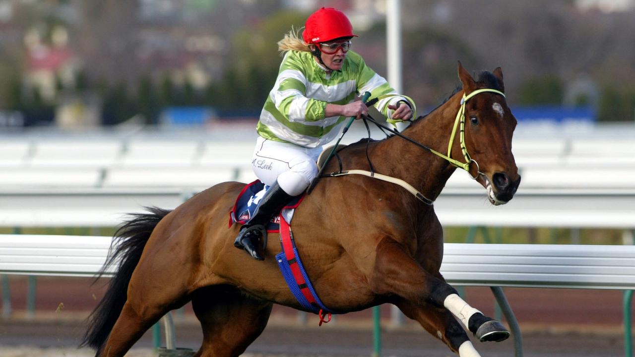 03/07/2004  Team Heritage riden by Andrea Leek runs on to win the Tooheys New Grand National Hurdle at Flemington. Digital Image