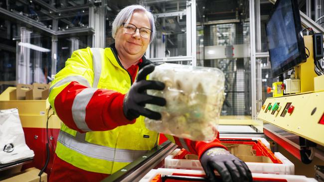 A team of 1000 staff will work with robots to pack online grocery shoppers' orders. Picture: Martin Keep/Coles