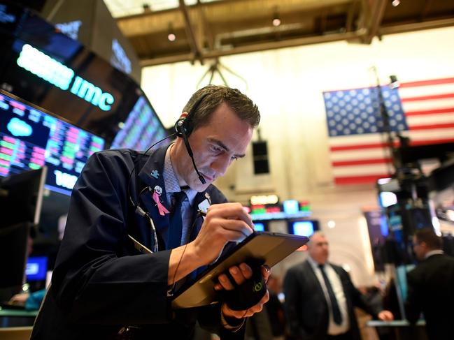 The Australian Stock Exchange board is sea of red once more after US markets fell in the wake of coronavirus. Picture: AFP