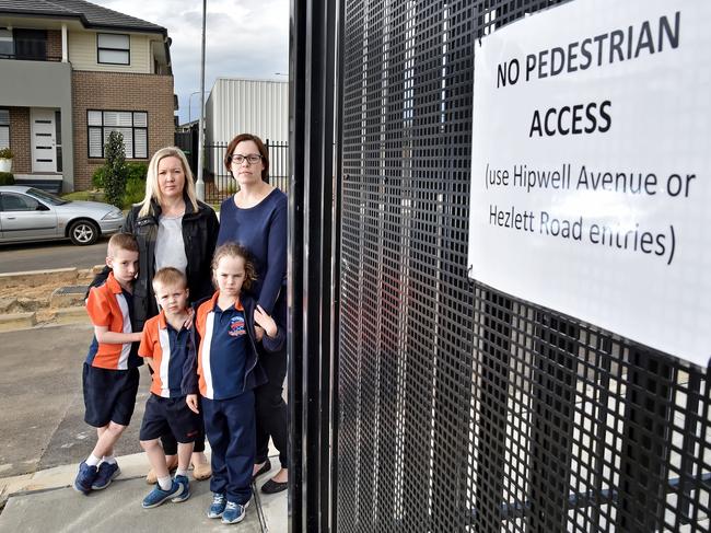 Rebecca Haynes (left) and NKPS P &amp; C chair Alison Nicolson (right) with children Lukas Haynes, 7, Lachlan Haynes, 5, and Charlotte Nicolson, 5. Picture: Troy Snook