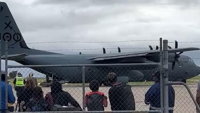 Residents in Kalkarindji wait to board evacuation flights run by the ADF. Picture: Supplied