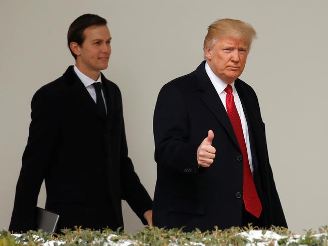 Donald Trump gives a thumbs-up, followed by Jared Kushner at the White House. Picture: Reuters/Kevin Lamarque