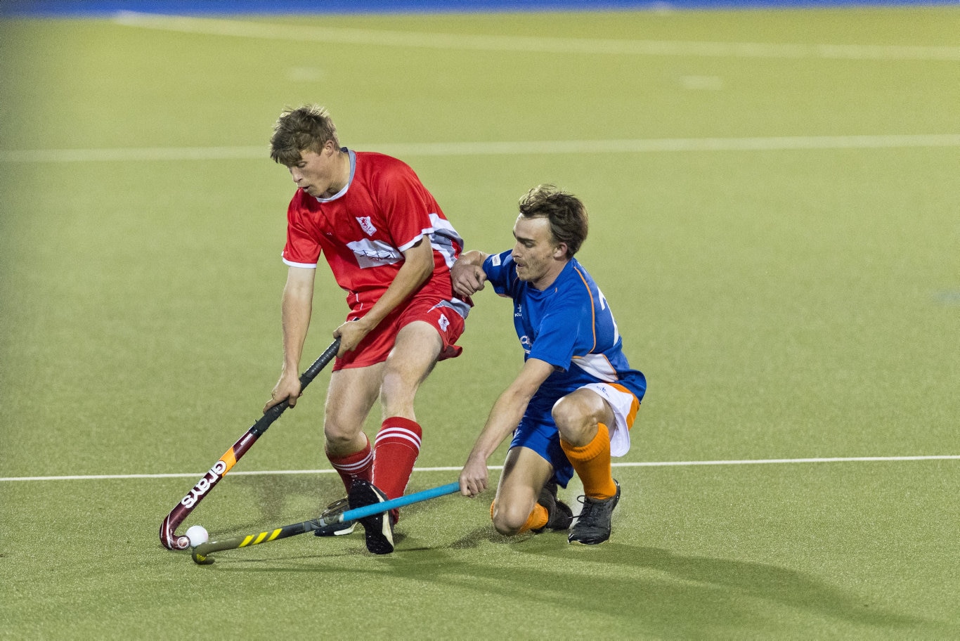 Tom Burge (left) for Red Lions and Nathan Politch of Newtown in Toowoomba Hockey COVID Cup men round four at Clyde Park, Friday, July 31, 2020. Picture: Kevin Farmer