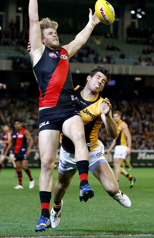 Michael Hurley and Alex Rance find themselves at the same end of the ground. Picture: Michael Klein