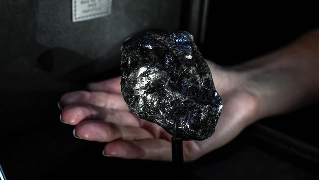 A huge, tennis ball sized rough diamond. Picture: by Stephanie de Sakutin /AFP