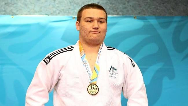 Timothy Hollingbery of Australia poses with his gold medal after the +90kg boys judo final on day 1 of the 2017 Youth Commonwealth Games.