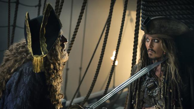 Hector Barbossa (Geoffrey Rush) and Captain Jack Sparrow (Johnny Depp) in a scene from Pirates of the Caribbean: Dead Men Tell No Tales.