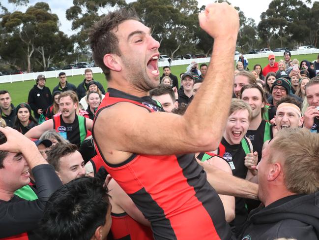 Michael Cardamone enjoying premiership success with Aquinas in 2019. He hopes to do the same at Doveton this year.