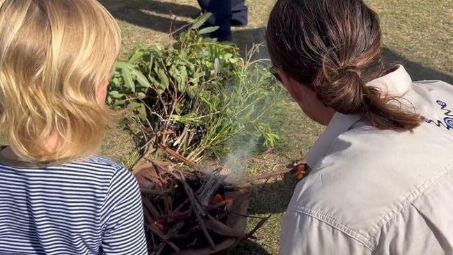 YAC chief operations officer Brentyn Lugnan performs a smoking ceremony at Urunga.