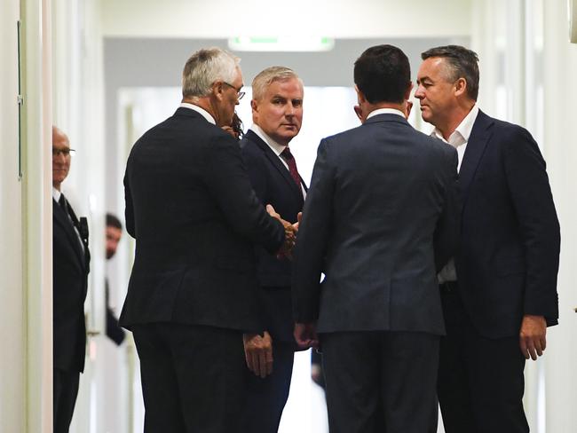 Re-elected Nationals Party leader Michael McCormack (right) and newly-elected Deputy leader David Littleproud are seen after Nationals a party leadership spill at Parliament House in Canberra, Tuesday, February 4, 2020. (AAP Image/Lukas Coch) NO ARCHIVING