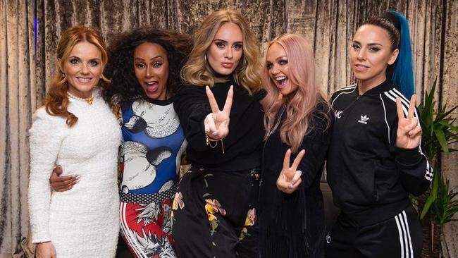 The Spice Girls with Adele.