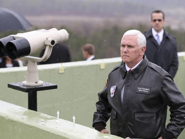 US Vice President Mike Pence looks at the North side from Observation Post Ouellette in the Demilitarised Zone (DMZ), near the border village of Panmunjom. Picture: Lee Jin-man