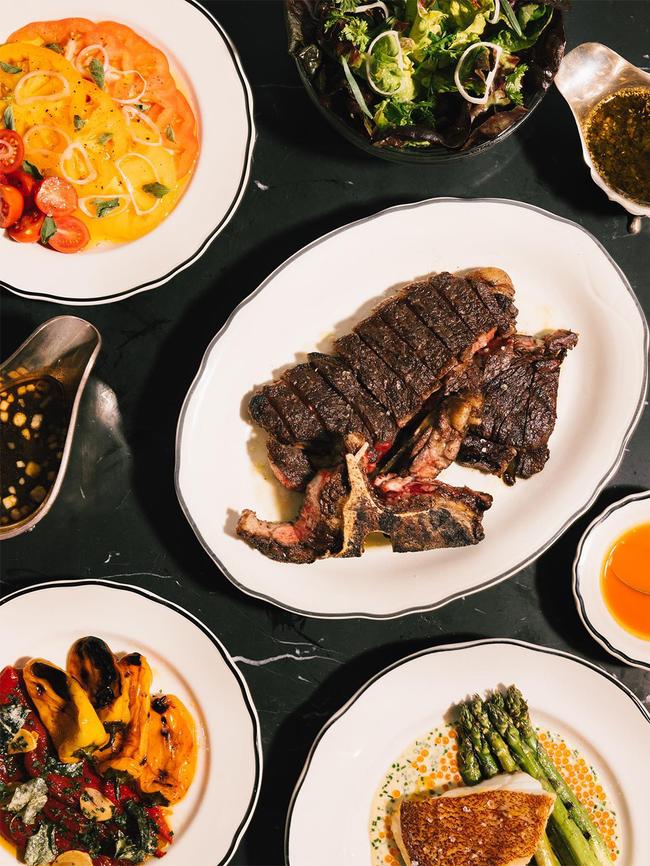 Dry-aged steak at Porteño, with sides. Picture: Porteño