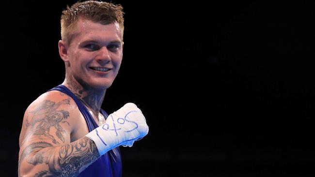 Daniel Jason Lewis reacts to winning his fight against Tomasz Jablonski of Poland in their men’s middleweight 75kg bout at the Rio 2016 Olympic Games (Photo by Mike Ehrmann/Getty Images)