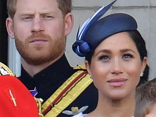 (L-R) Britain's Prince Harry, Duke of Sussex, Britain's Meghan, Duchess of Sussex, James, Viscount Severn and Isla Phillips stand with other members of the Royal Family on the balcony of Buckingham Palace to watch a fly-past of aircraft by the Royal Air Force, in London on June 8, 2019. - The ceremony of Trooping the Colour is believed to have first been performed during the reign of King Charles II. Since 1748, the Trooping of the Colour has marked the official birthday of the British Sovereign. Over 1400 parading soldiers, almost 300 horses and 400 musicians take part in the event. (Photo by Daniel LEAL-OLIVAS / AFP)