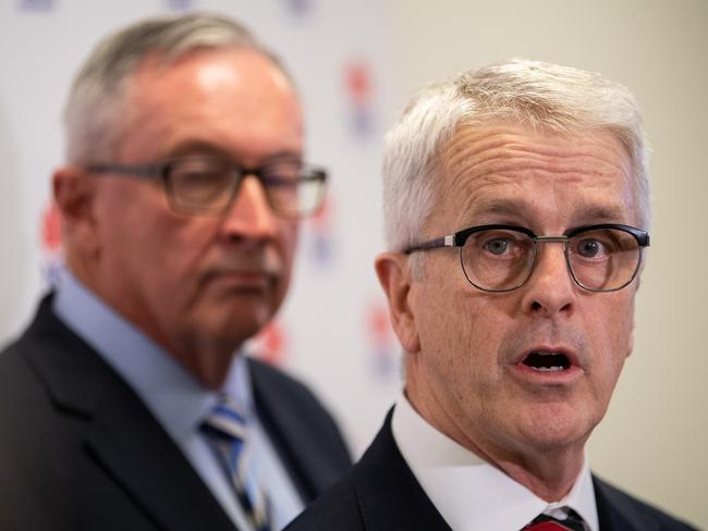 Australian virologist Dominic Dwyer, right, with NSW Health Minister Brad Hazzard. Picture: AAP