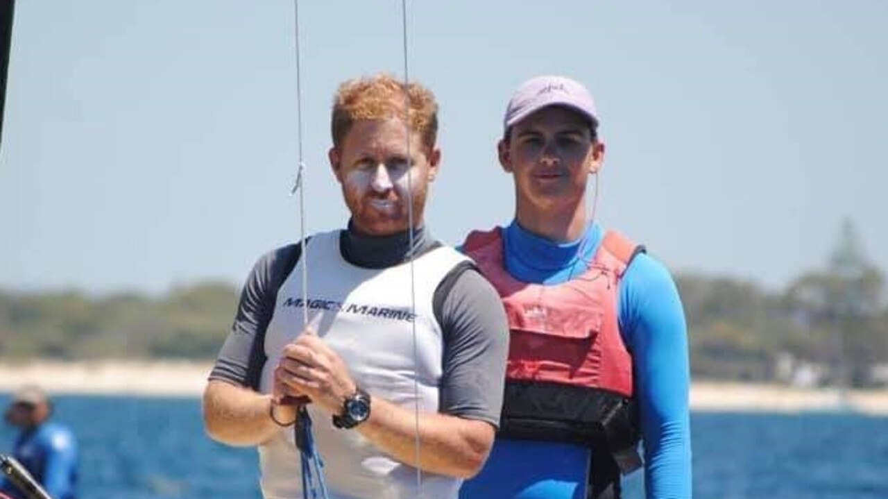 Morgan Frew, left, aboard his skiff. He will be doing his eighth Sydney to Hobart this year.