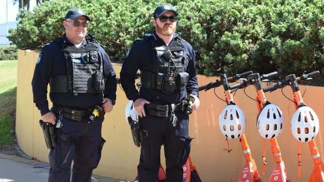 Senior Constable Phil Marshall and Senior Constable Jack Casey speak on e-scooter safety ahead of Townsville's Operation Ride Safe. Picture: Nikita McGuire