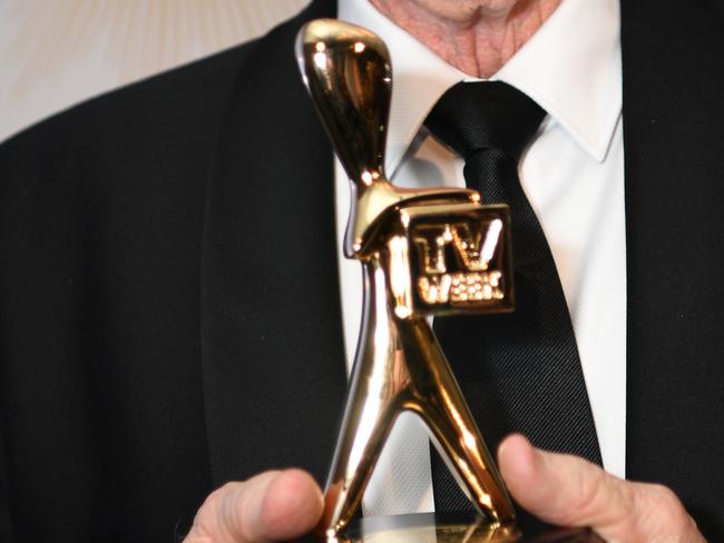 Veteran journalist Kerry O'Brien poses with a Logie award after he was inducted into the Logies Hall of Fame during the 2019 Logie Awards at The Star Casino on the Gold Coast, Sunday, June 30, 2019. (AAP Image/Dan Peled) NO ARCHIVING, EDITORIAL USE ONLY