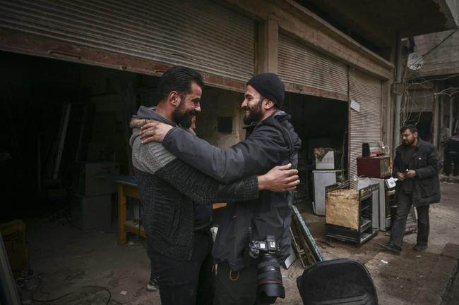 Sameer meets an old friend in his heavily-damaged neighbourhood