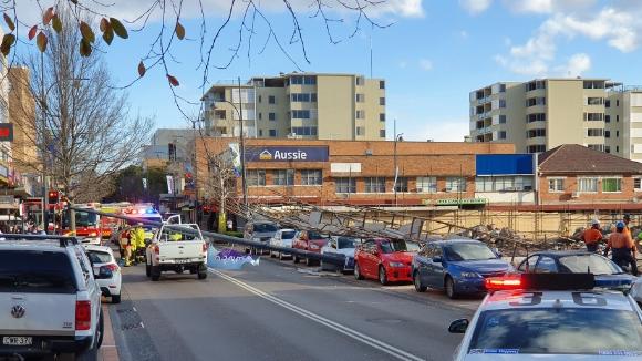 Scaffolding has collapsed onto a number of cars in Gosford. Picture: Fiona Killman